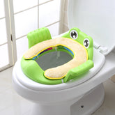 Baby Children Toilet Seat Toilet for toddlers with frog design, soft surface, and adjustable non-slip pads.
