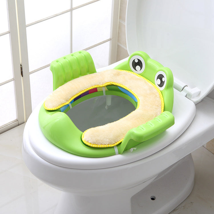 Baby Children Toilet Seat Toilet for toddlers with frog design, soft surface, and adjustable non-slip pads.